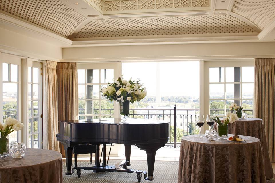 Grand piano with picturesque window