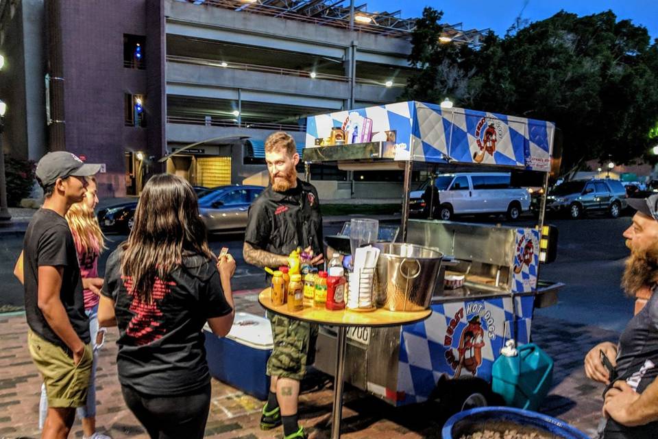 Excited people ready to enjoy locally made wieners and sausages