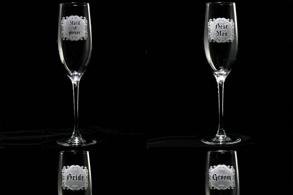 Bridesmaid gift ideas, groomsmen gifts such as best man and maid of honor engraved champagne toasting flute glasses. Great bridal party toasting champagne flutes and glasses.