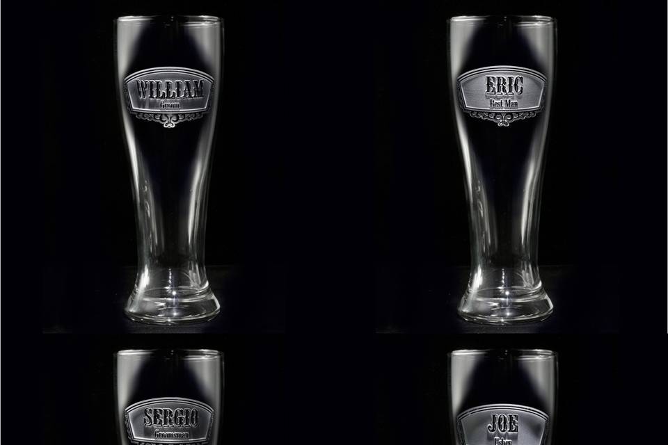 Groomsman gift ideas, bridesmaid gift ideas such as best man and maid of honor engraved beer pilsner glasses.