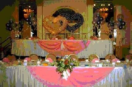 Standard rental on this Beautiful Back drop and Head table decor $180.00
