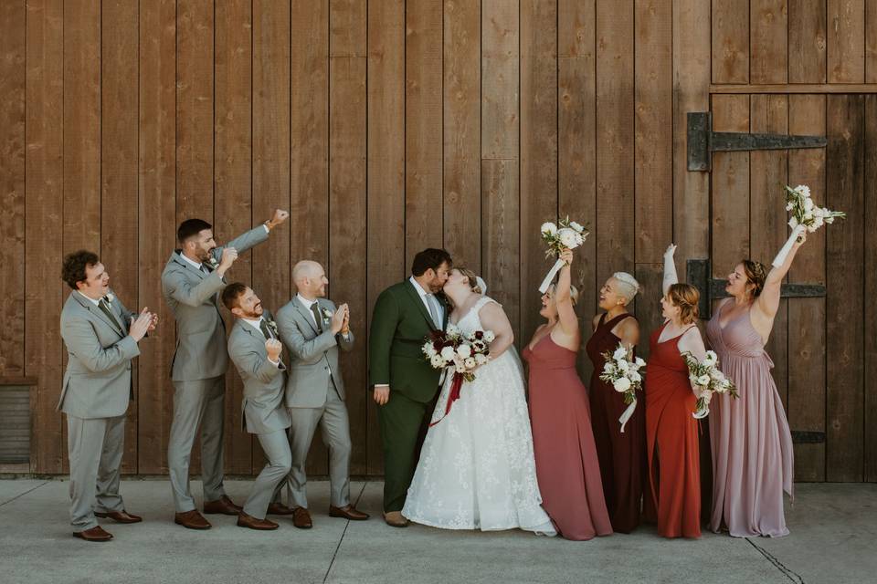 Wedding party in front of Barn