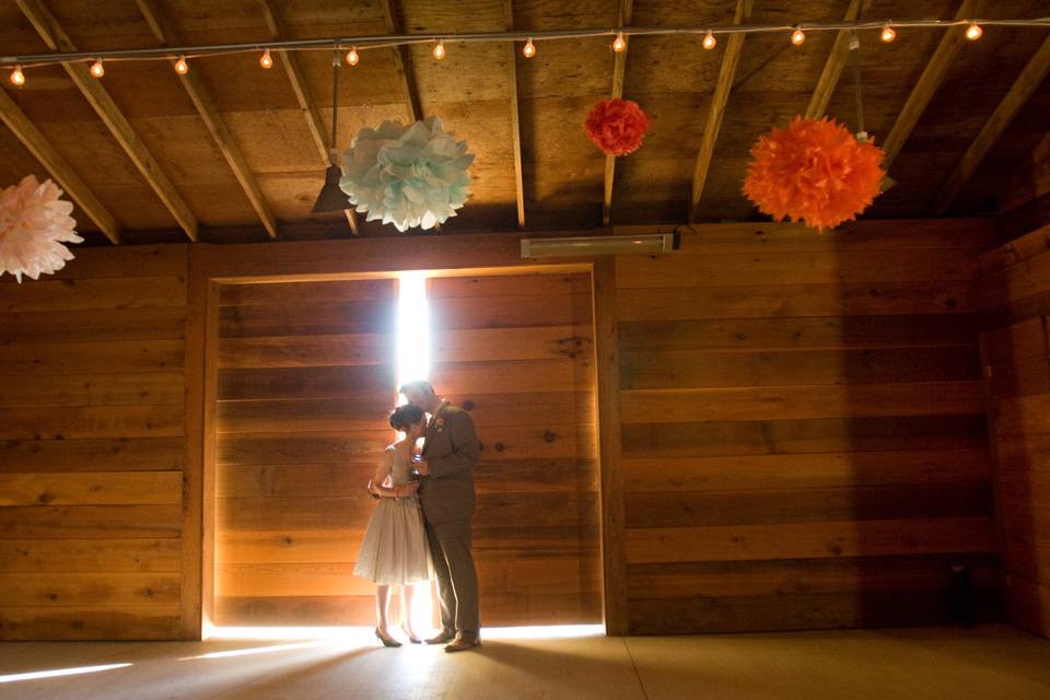 Couple in a barn venue