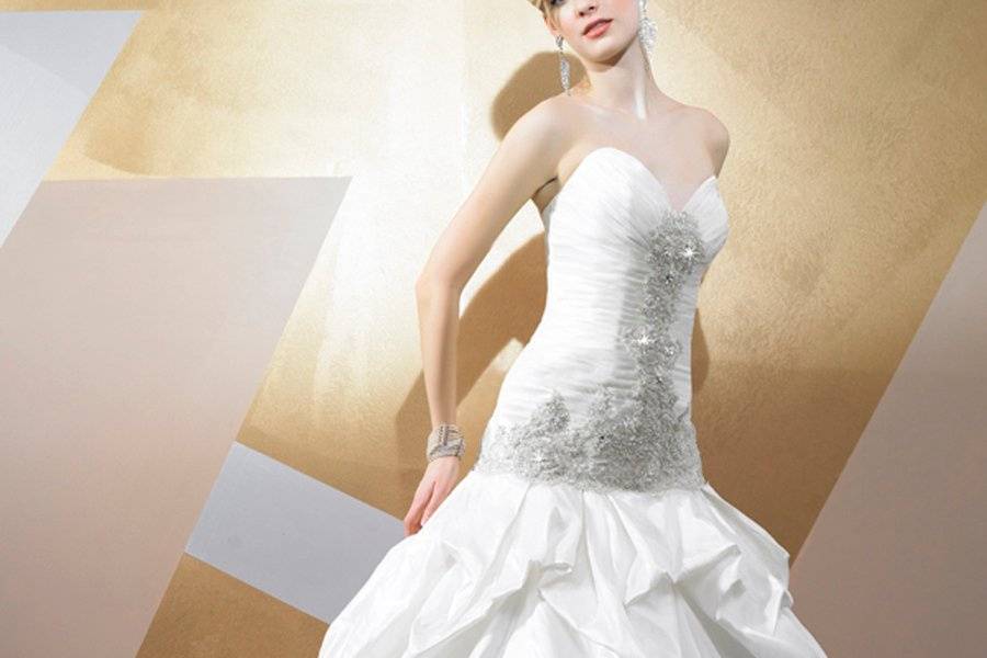 Style D8005
Strapless unique Italian Silk Taffeta ball gown with pickups, elegant silver lace, and Swarovski beading throughout the bodice.