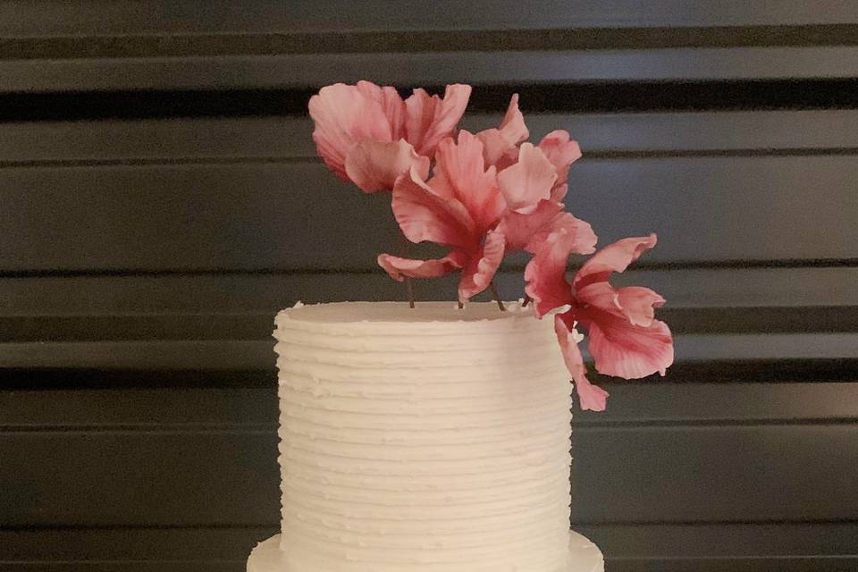 Butter cream wedding cake with