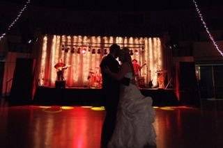 Couple dancing with dramatic lighting