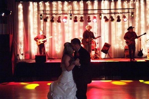 Couple dancing as the band plays