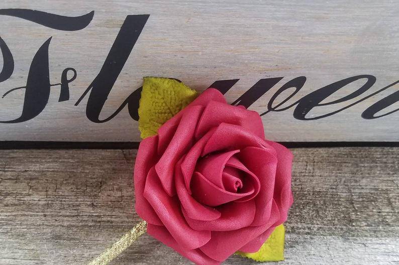 Burgundy rose boutonniere