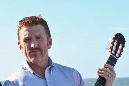 Mike McCall, Spanish Guitarist before a wedding at Montara Beach