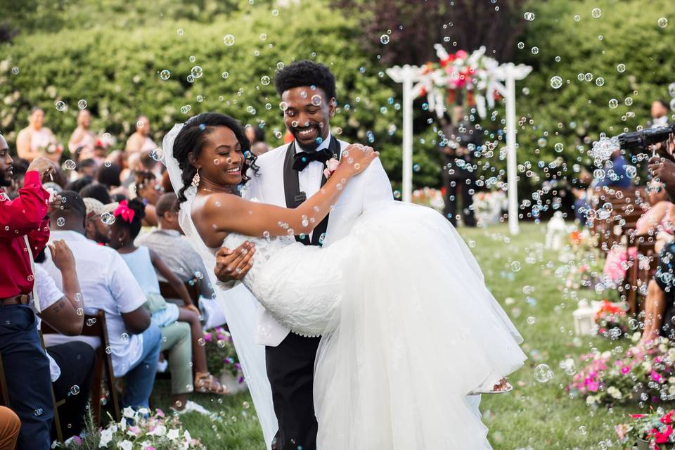 Newlyweds leaving ceremony