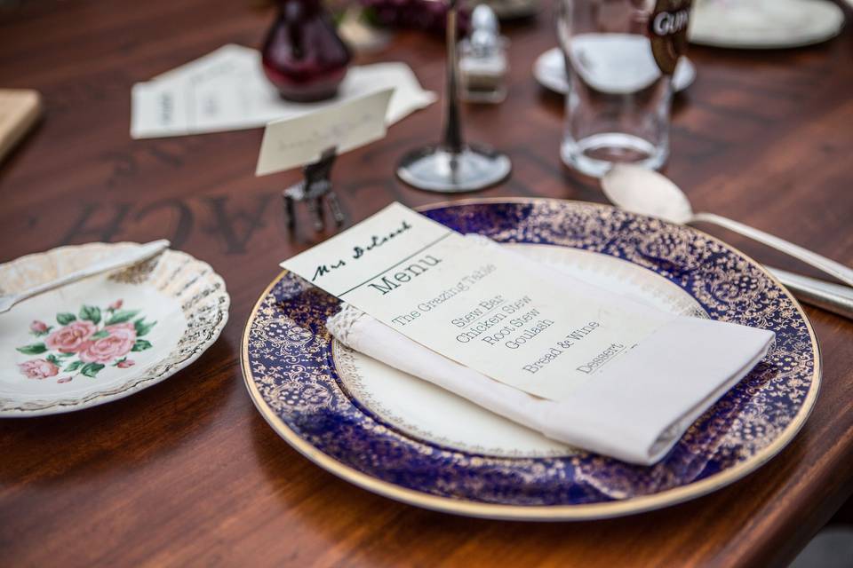 Vintage china & menu place cards for reception.