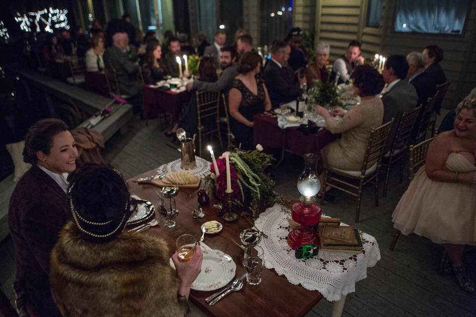 Romance, vintage - the vibes for this backyard deck reception in New Bern, NC. Photo by Justin Driscoll.