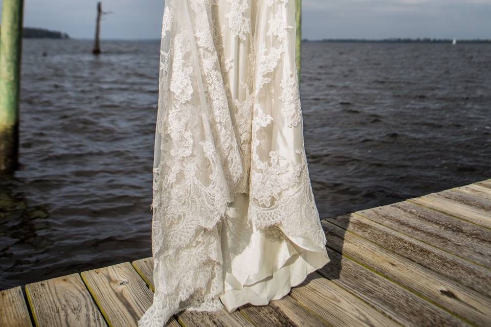 Wedding gown on the Neuse River in New Bern, NC. Photo by Justin Driscoll.