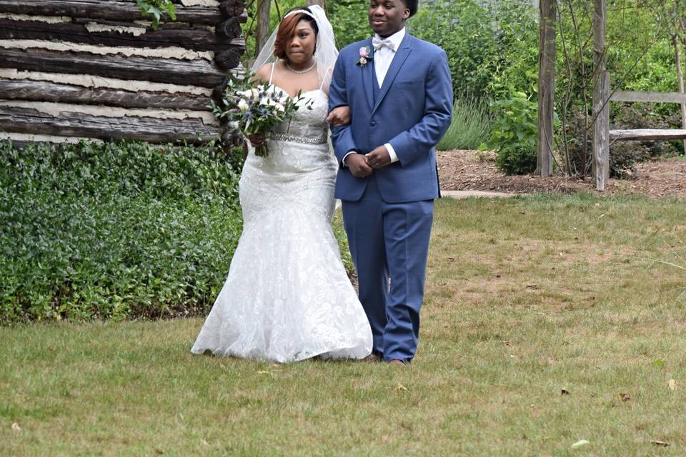 Bride aisle walk with son