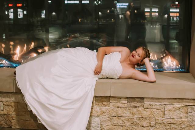 Lounging bride by the fire