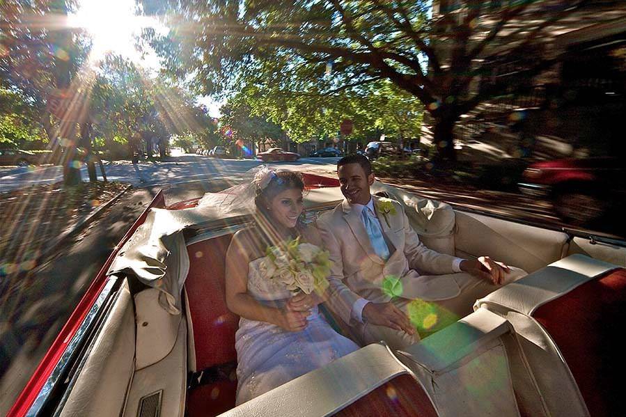 Couple in their wedding car