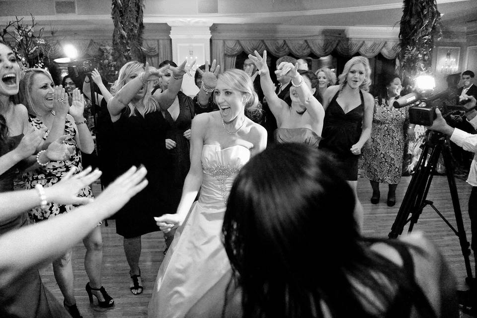 Bride dancing with her friends