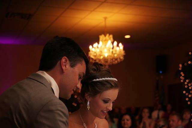 Couples cake cutting in Montecarlo room