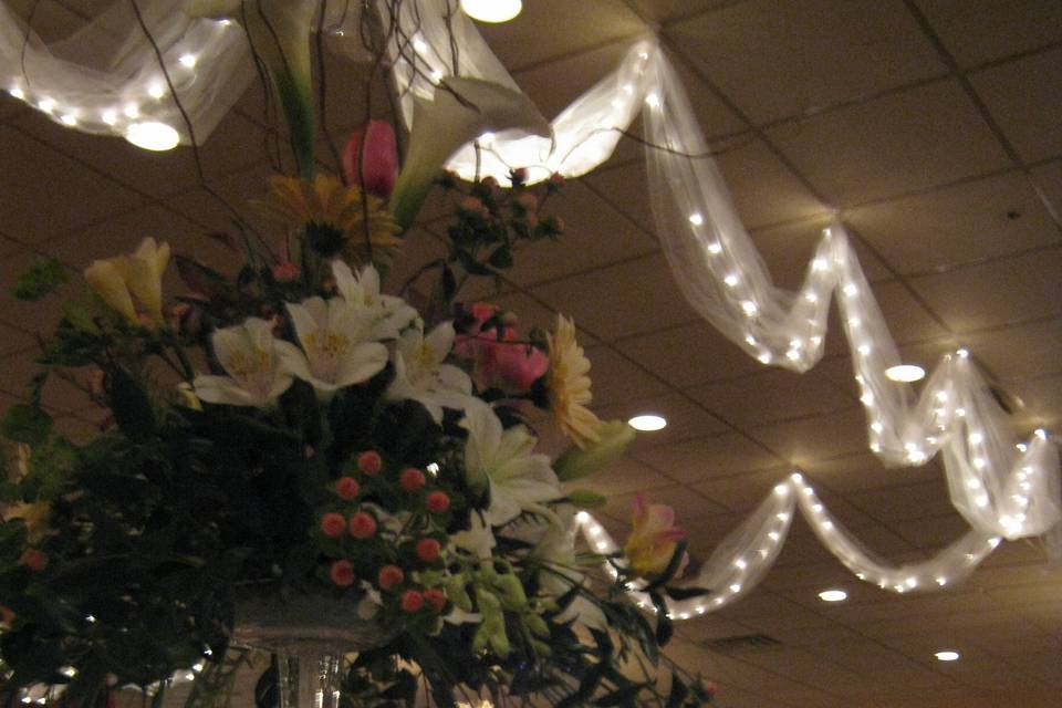 Artistic flower arrangement with a classic lights setup