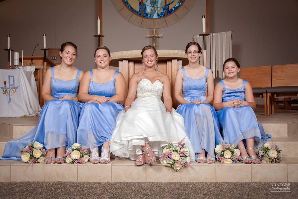 A beautiful bride and her entourage.