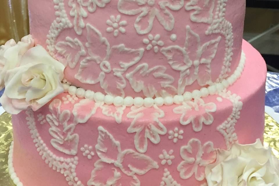 An ombre buttercream cake with henna style brush embroidery!