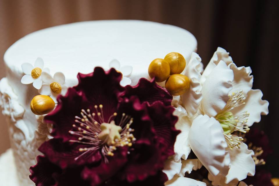 These beautiful sugar paste flowers were created for an unique textured icing cake for a very special couple!