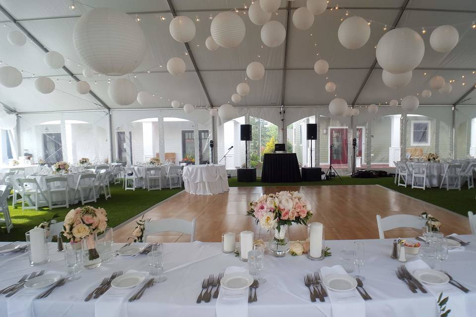 String lighting and white paper lanterns at the Lake House Guest Cottages of the Berkshires.