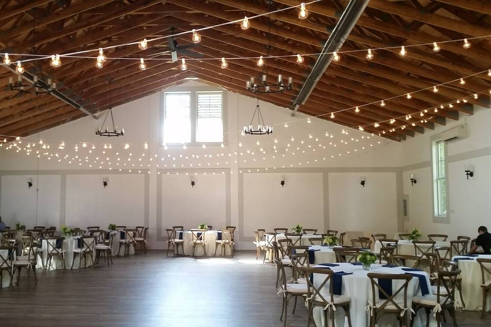 String lighting inside the Harvest Barn at Meadow View at Cranwell Resort in Lenox, Mass.