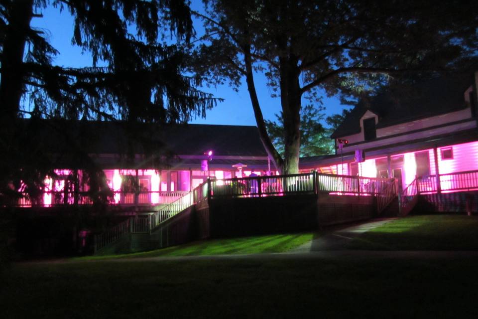 Uplighting outside the Harvest Barn creates a Miami lounge vibe at the Meadow View complex at Cranwell Resort in Lenox, Mass.