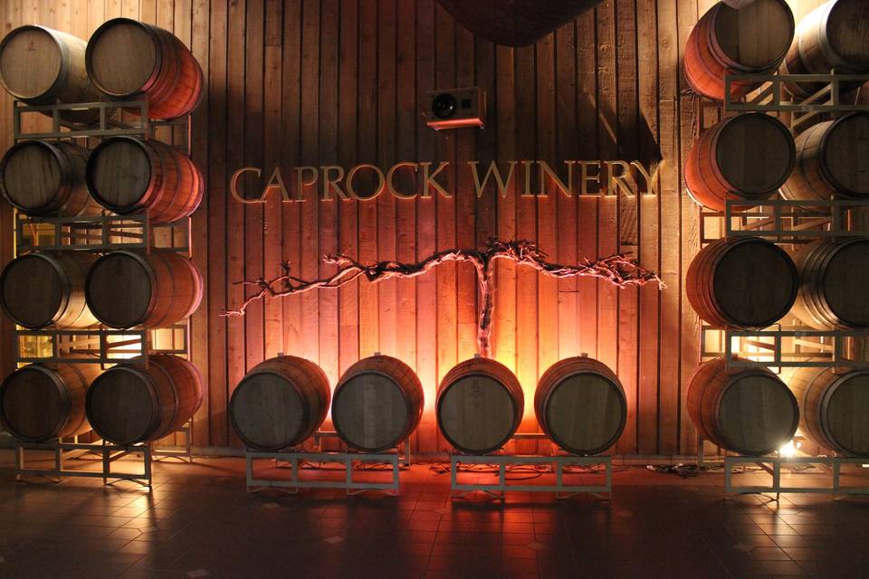 The up-lighting in the Barrel Room is updated with the colors of your wedding.