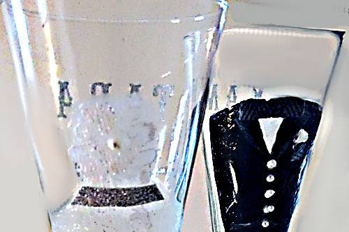 Bride and groom hand painted wedding glasses made with real lace, pearls and a real bow tie. Perfect wedding glasses.
