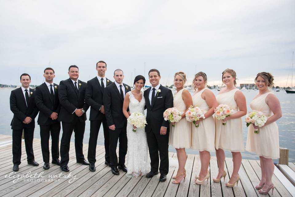 The couple with the bridesmaids and groomsmen