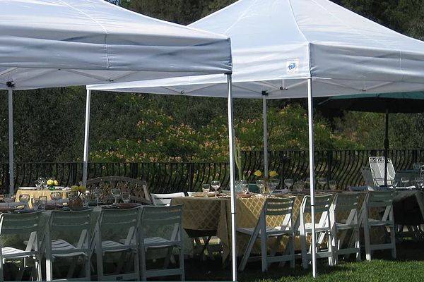 Outdoor table setup with tent