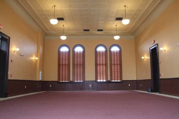 Gorgeous ballroom boasts high pressed-tin ceiling, wainscotting and beautiful color combination.  Seats approximately 100, more depending on room layout.