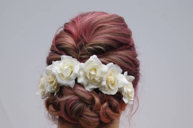 Pink updo with white flowers