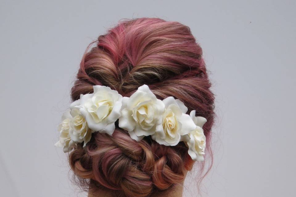 Pink updo with white flowers