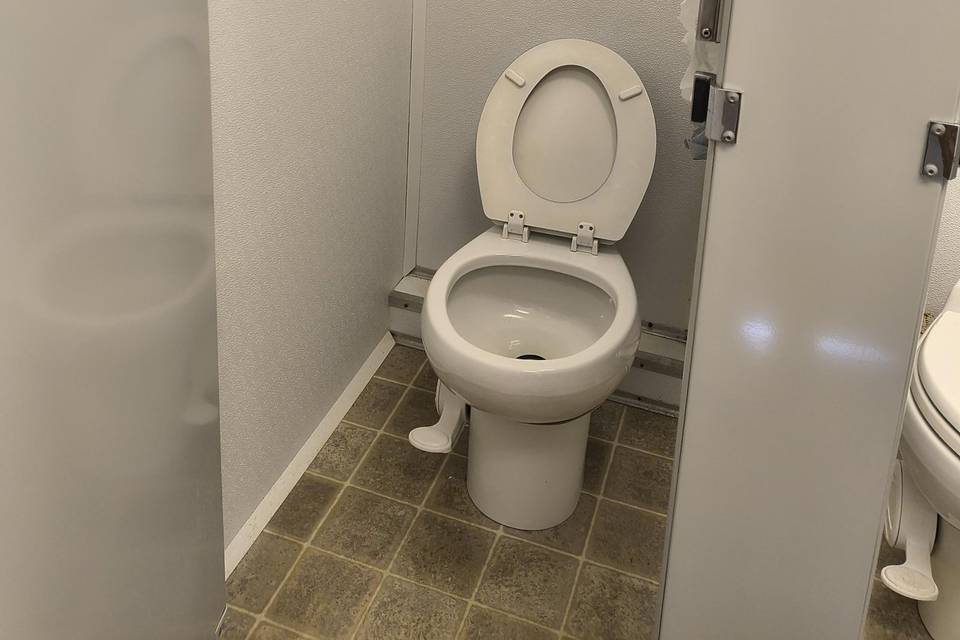 Women's restroom toilets