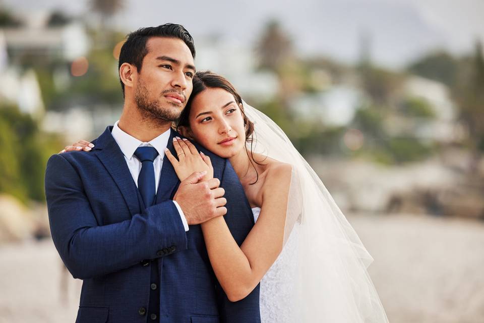 shot-of-a-young-couple-on-the-beach-on-their-weddi-2026-01-09-09-54-06-utc.jpg
