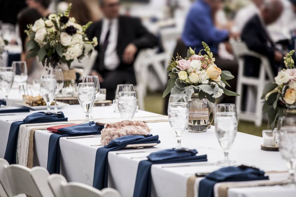 table-set-up-for-wedding-reception-with-people-out-2026-03-17-09-05-02-utc.jpg