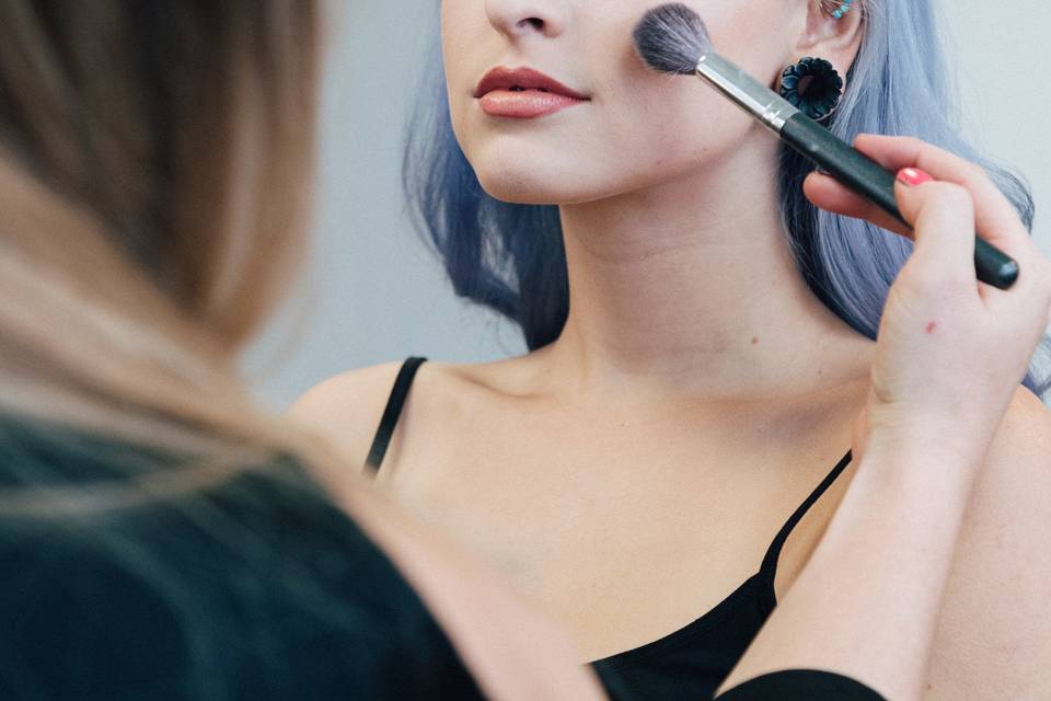 FINISHING TOUCHES ON MAKEUP