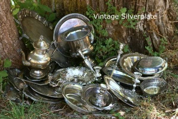lots and lots of vintage silverplate trays, candlesticks, vases, pitchers, etc...