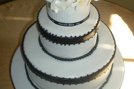 Black & White Cake - Double Chocolate cake alternate with White Cake and filled with Hazelnut Cheeseckae flavored mousse.