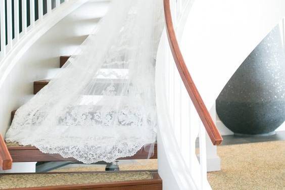 Bride's entrance into reception down spiral staircase at Sugar Beach Pavilion