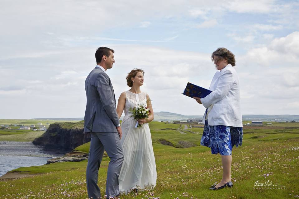A summer cliff side ceremony at the magical Doonagore Bay