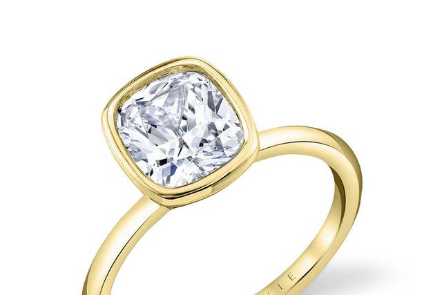 Bezel set yellow gold ring