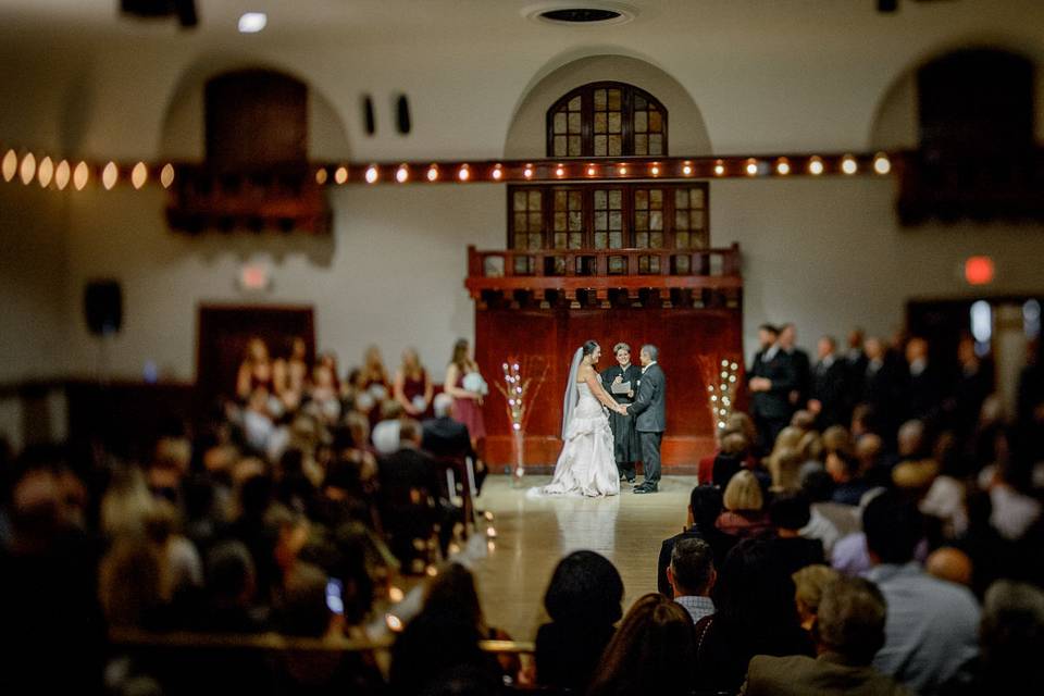 The theater style ceremony room, Ella's Theater, provides a rich background to your ceremony.