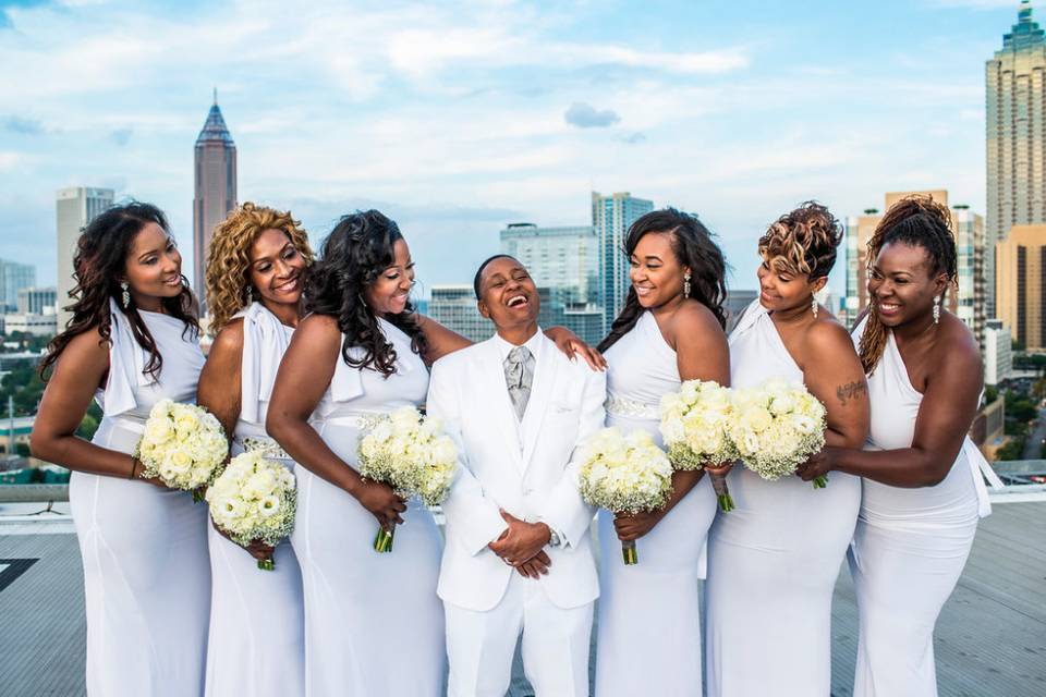 Couple with bridesmaids