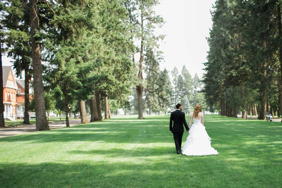 Couple leisurely walk hand in hand​