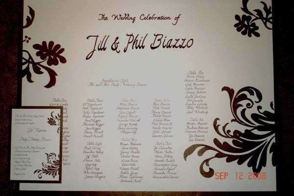 Seating chart with hand cut scroll work to perfectly match the invitation
