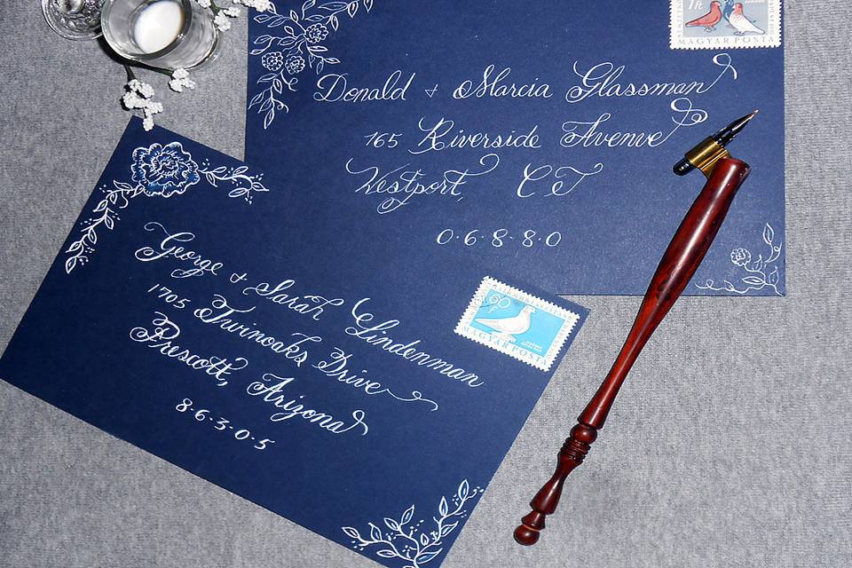 Calligraphy addressed Blue Envelope with Roses and Leaves design using dip nib and White ink.